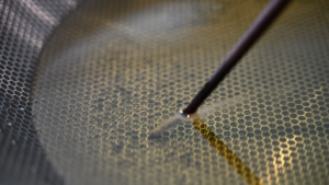Bubbles around wooden chopstick