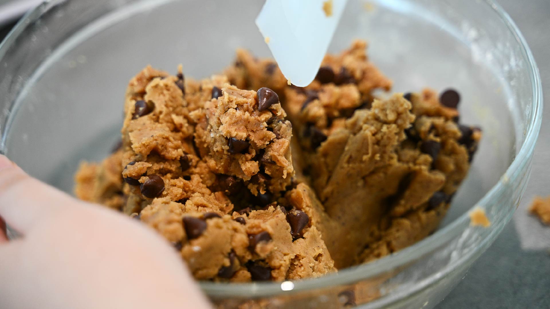mixing in chocolate chips
